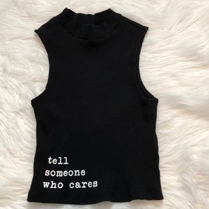 “Tell someone who cares” mid-crop top Size Small